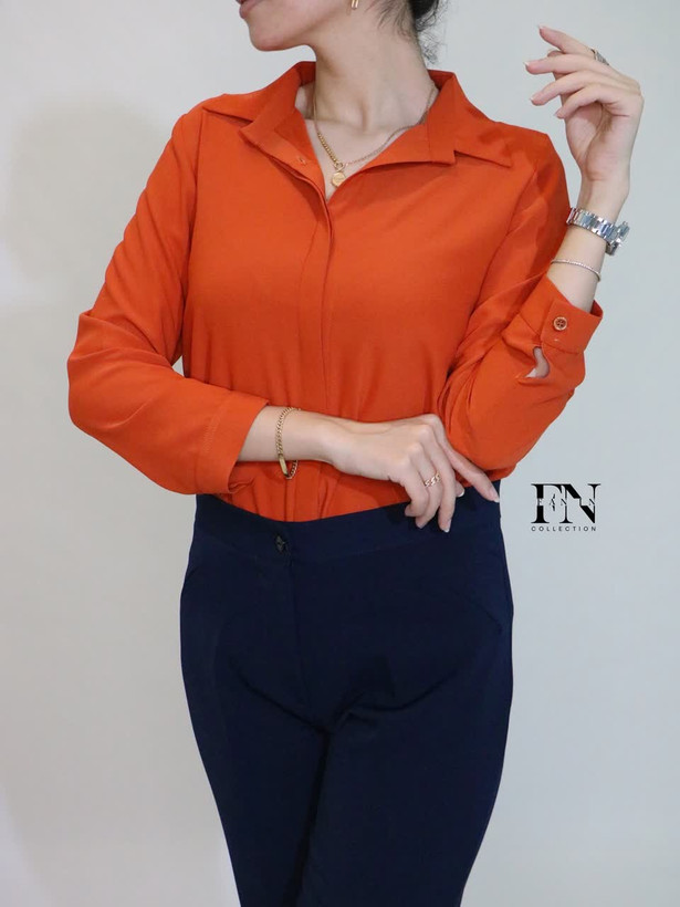 شومیز زنانه بیسیک یقه مردانه ساتن نارنجی با طراحی ساده و شیک